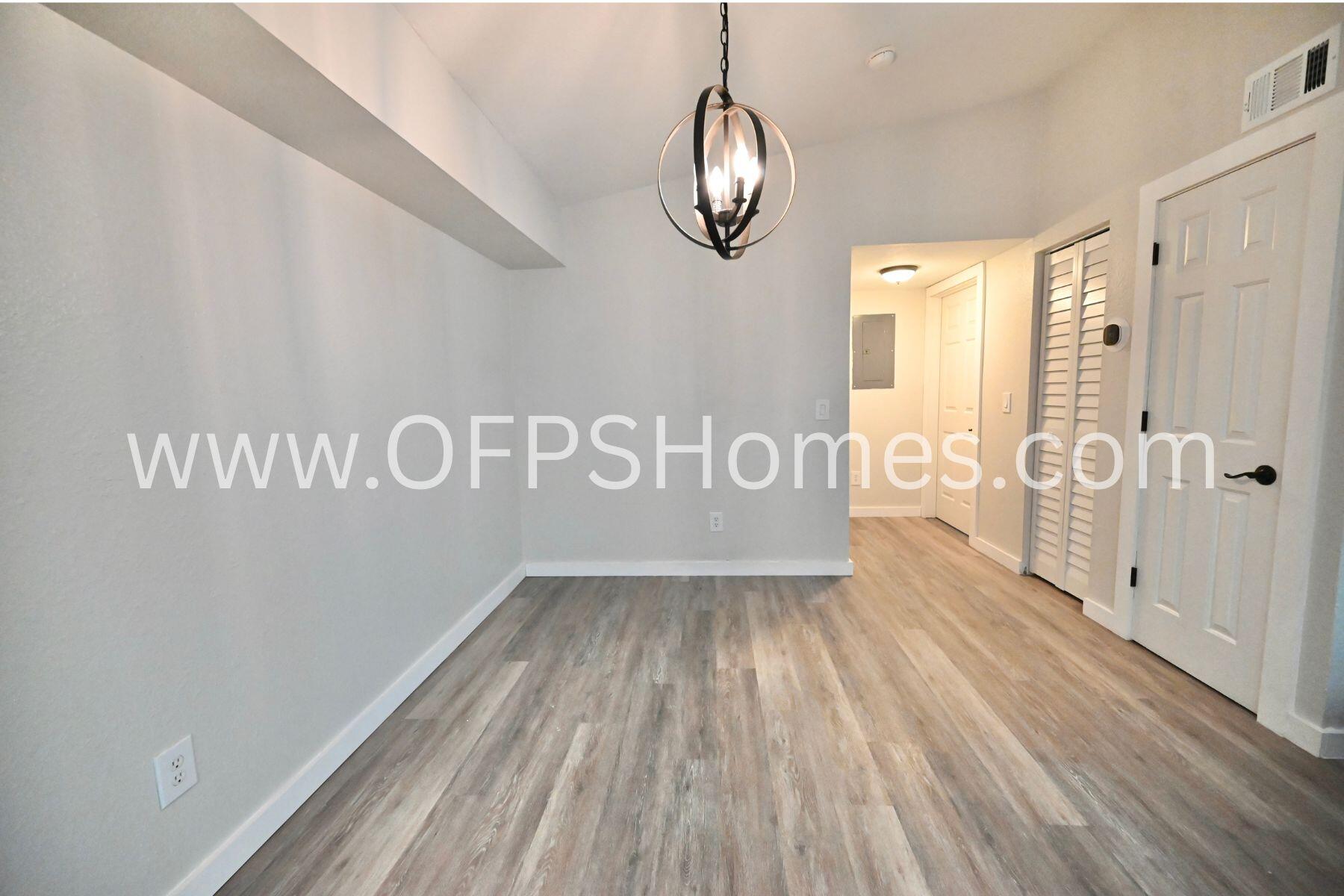 4030 Dancing Cloud Court, Unit 346 Destin, FL 32541 - Photo 10 of 19 a view of a room with wooden floor