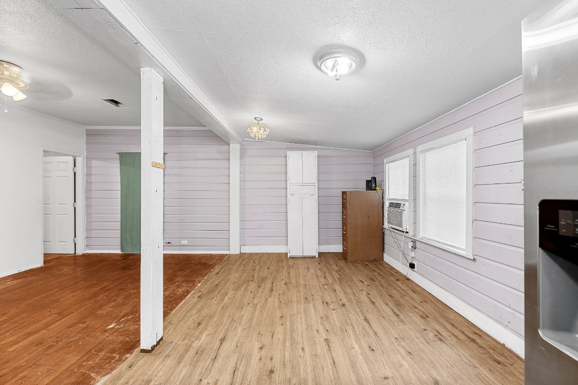 402 East 4th Street Taylor, TX 76574 - Photo 14 of 18 a view of livingroom with hardwood