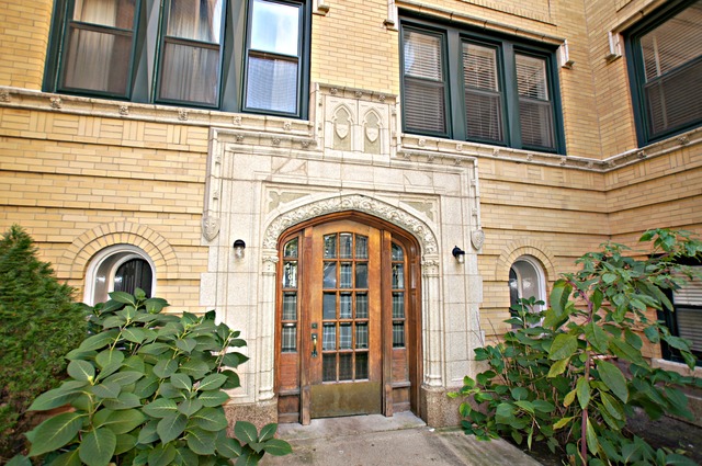 4110 North Keystone Avenue, Unit 3E Chicago, IL 60641 - Photo 4 of 21 a view of a house with large windows