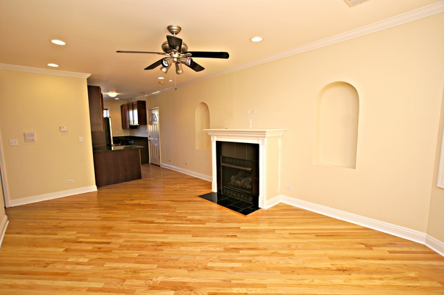4110 North Keystone Avenue, Unit 3E Chicago, IL 60641 - Photo 8 of 21 a view of a livingroom with a fireplace