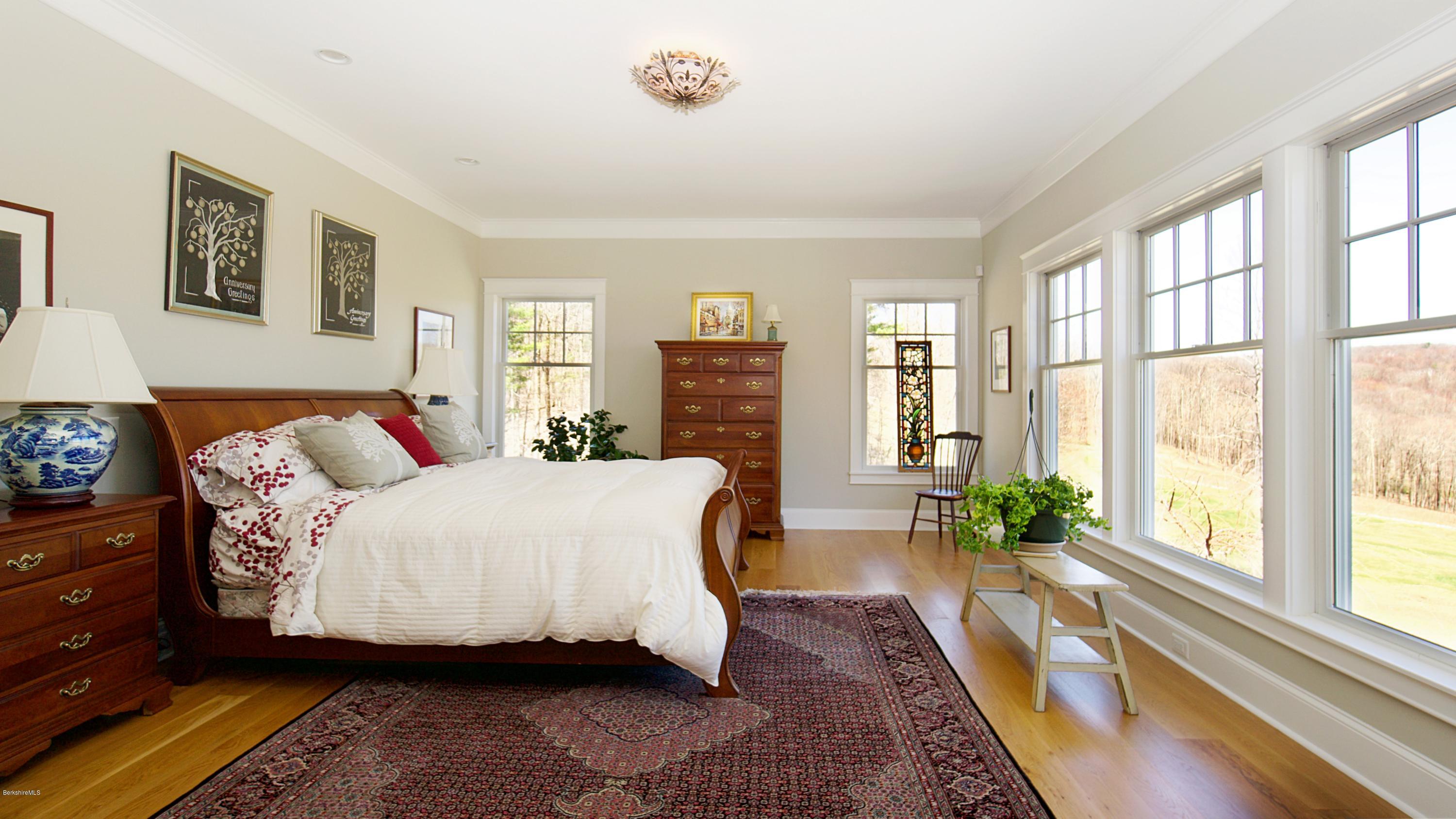 32 Oxbow Road Egremont, MA 01230 - Photo 13 of 35 a bed room with a bed and a couch