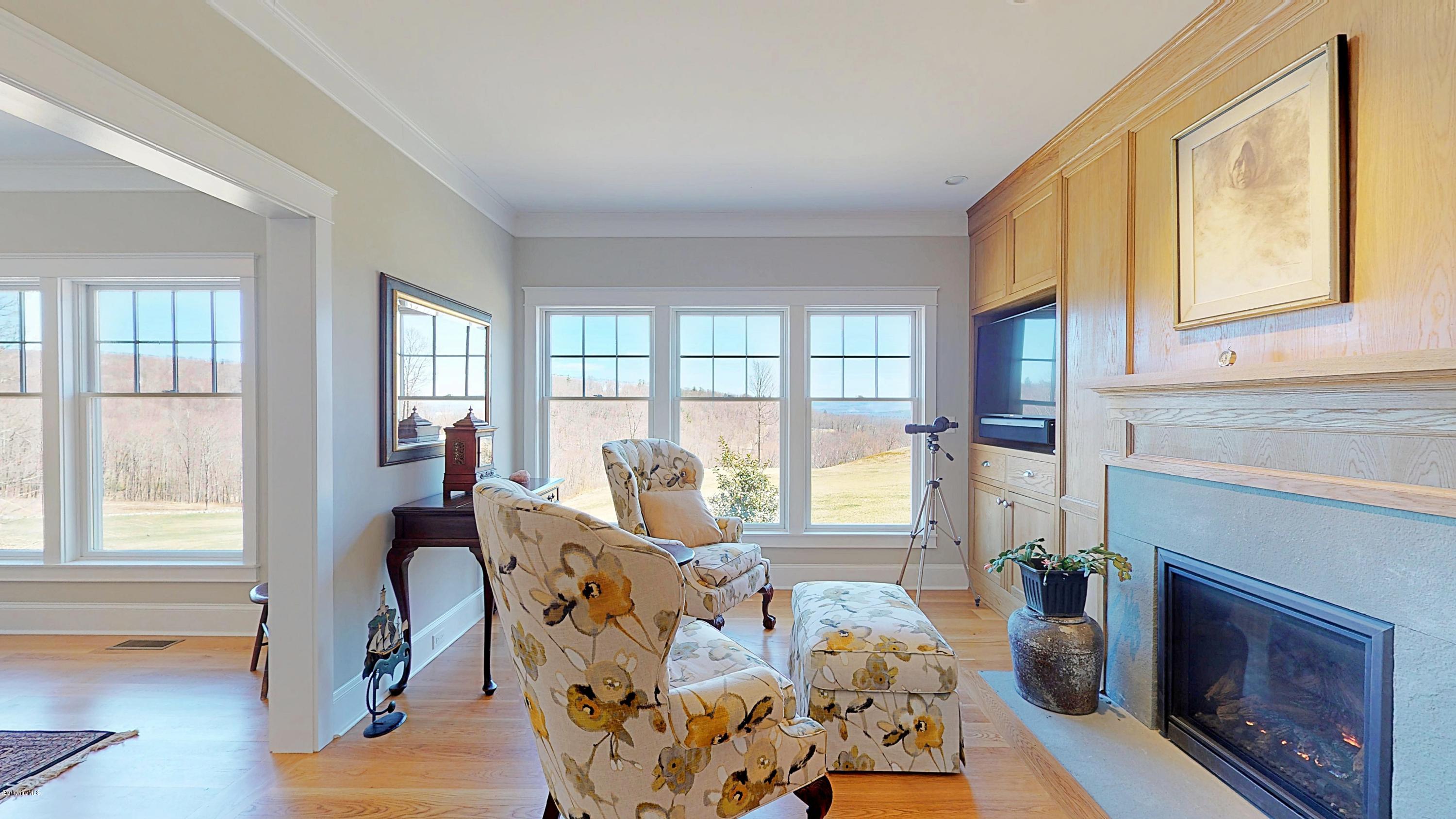 32 Oxbow Road Egremont, MA 01230 - Photo 14 of 35 a living room with furniture and a fireplace