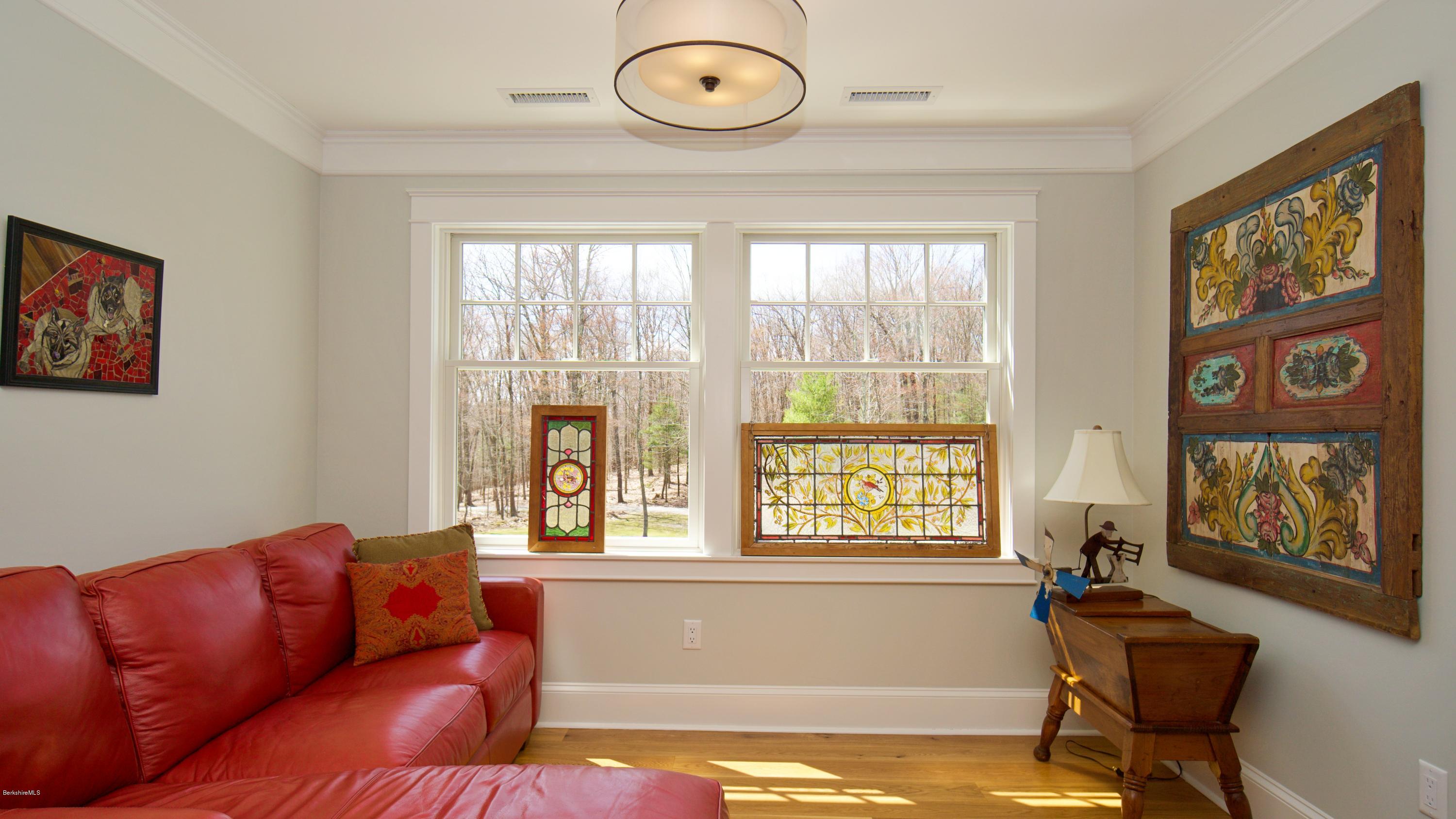 32 Oxbow Road Egremont, MA 01230 - Photo 21 of 35 a living room with furniture and a window