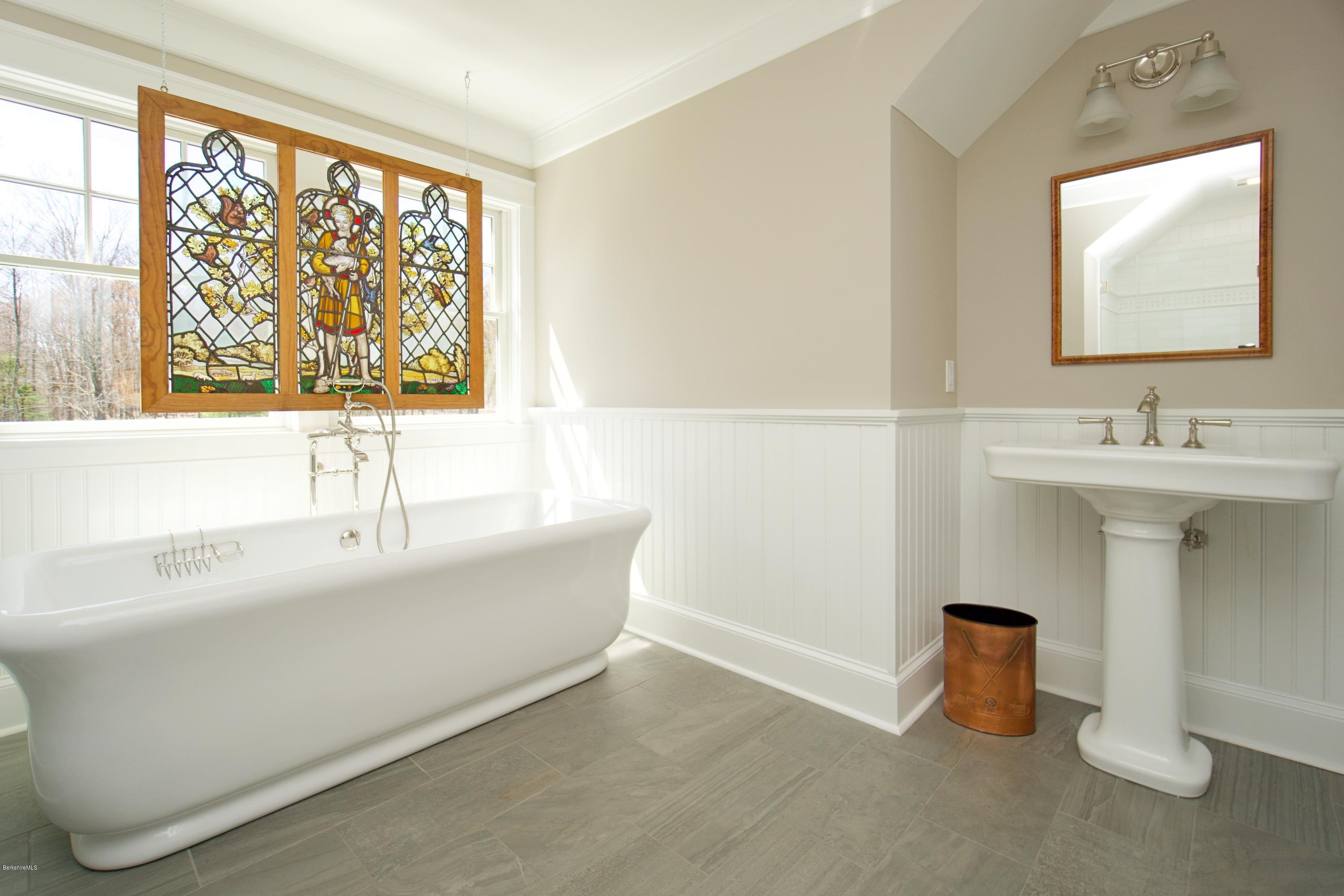 32 Oxbow Road Egremont, MA 01230 - Photo 26 of 35 a bathroom with a sink and a bathtub