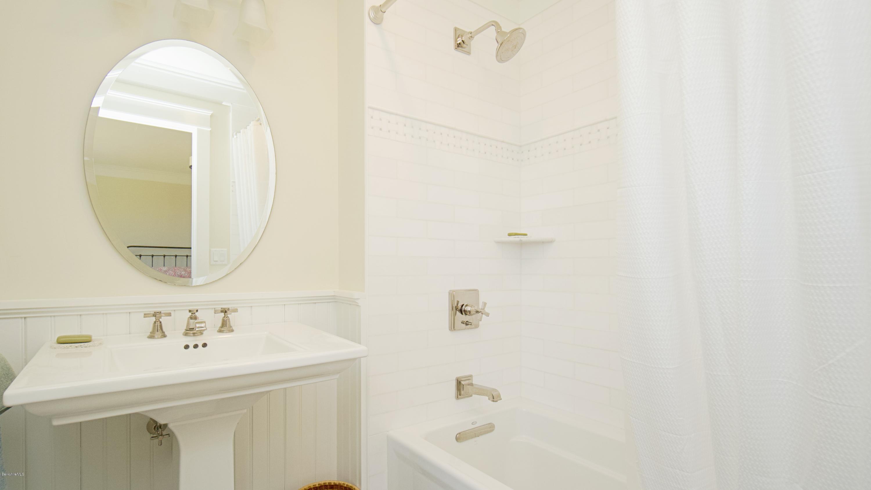 32 Oxbow Road Egremont, MA 01230 - Photo 28 of 35 a bathroom with a sink a toilet and shower