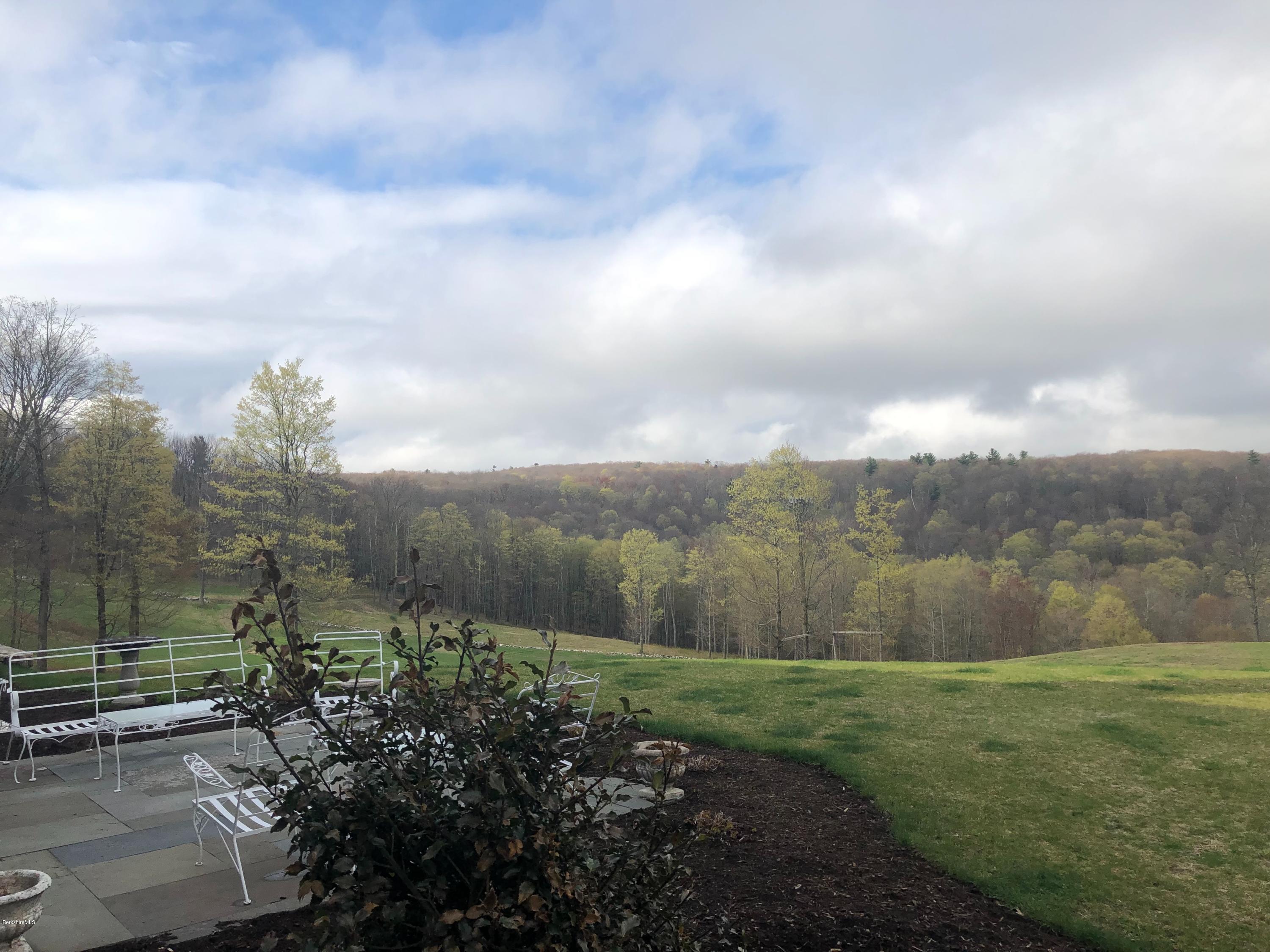 32 Oxbow Road Egremont, MA 01230 - Photo 29 of 35 a view of a yard with an outdoor seating