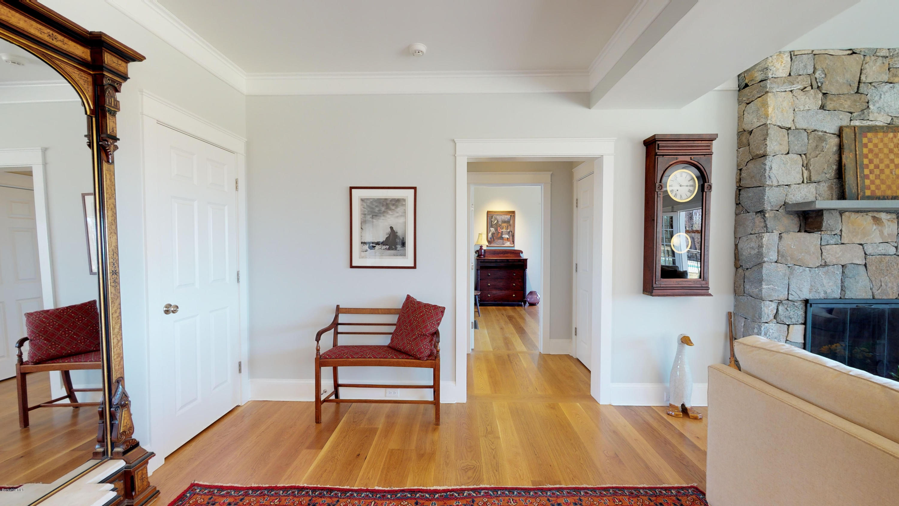 32 Oxbow Road Egremont, MA 01230 - Photo 9 of 35 a living room with furniture and a wooden floor
