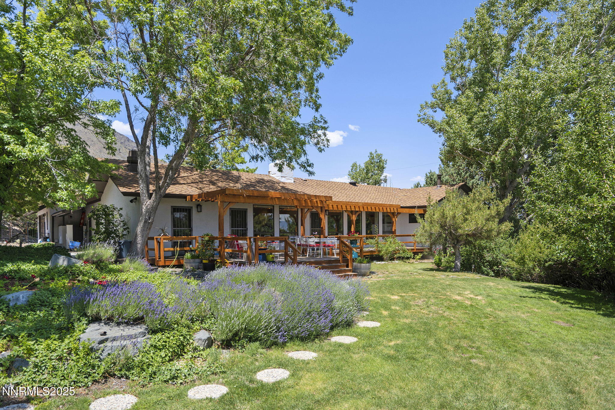 2548 Jacks Valley Road Genoa, NV 89411 - Photo 1 of 51 a view of a house with a yard