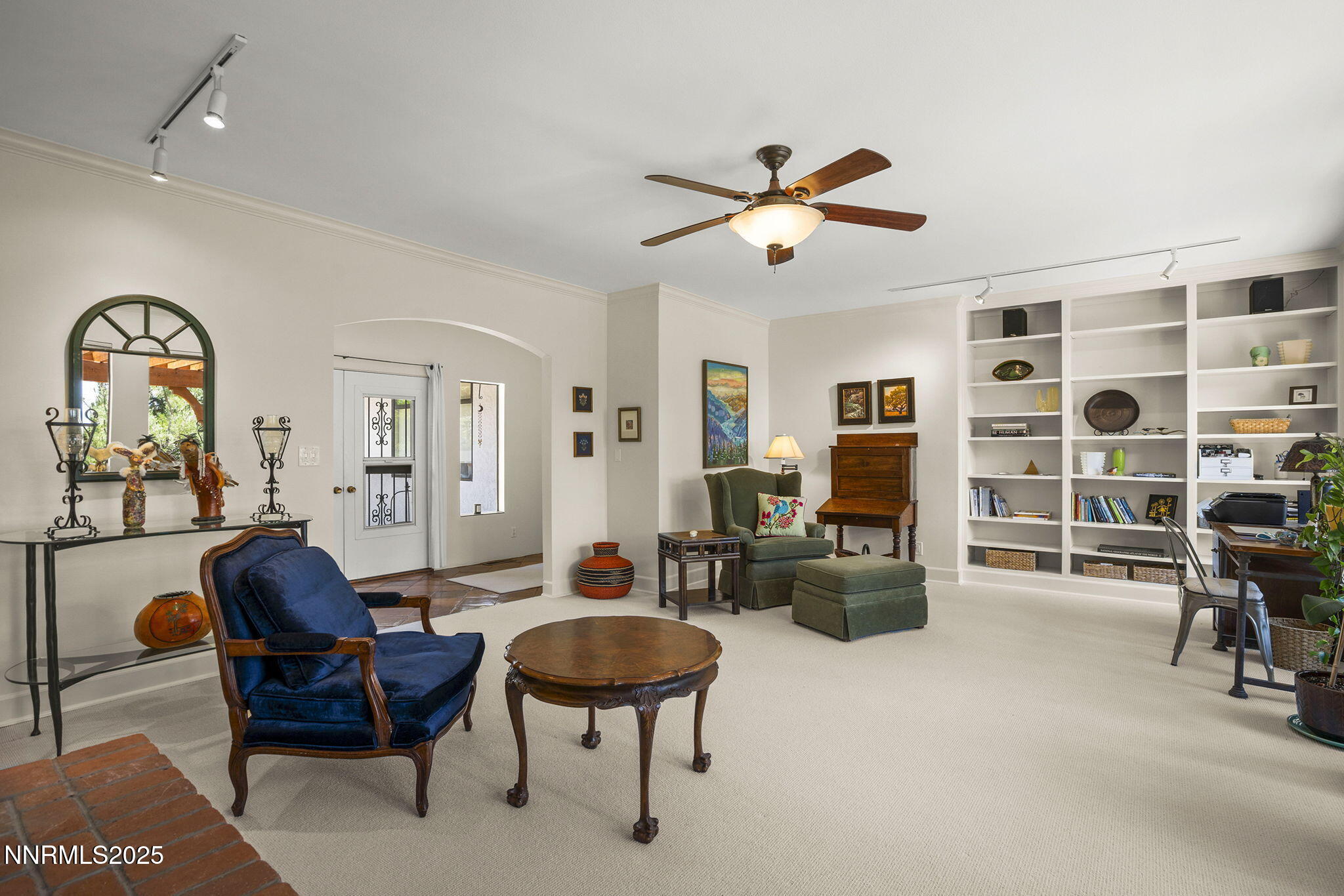 2548 Jacks Valley Road Genoa, NV 89411 - Photo 13 of 51 a living room with furniture and a chandelier