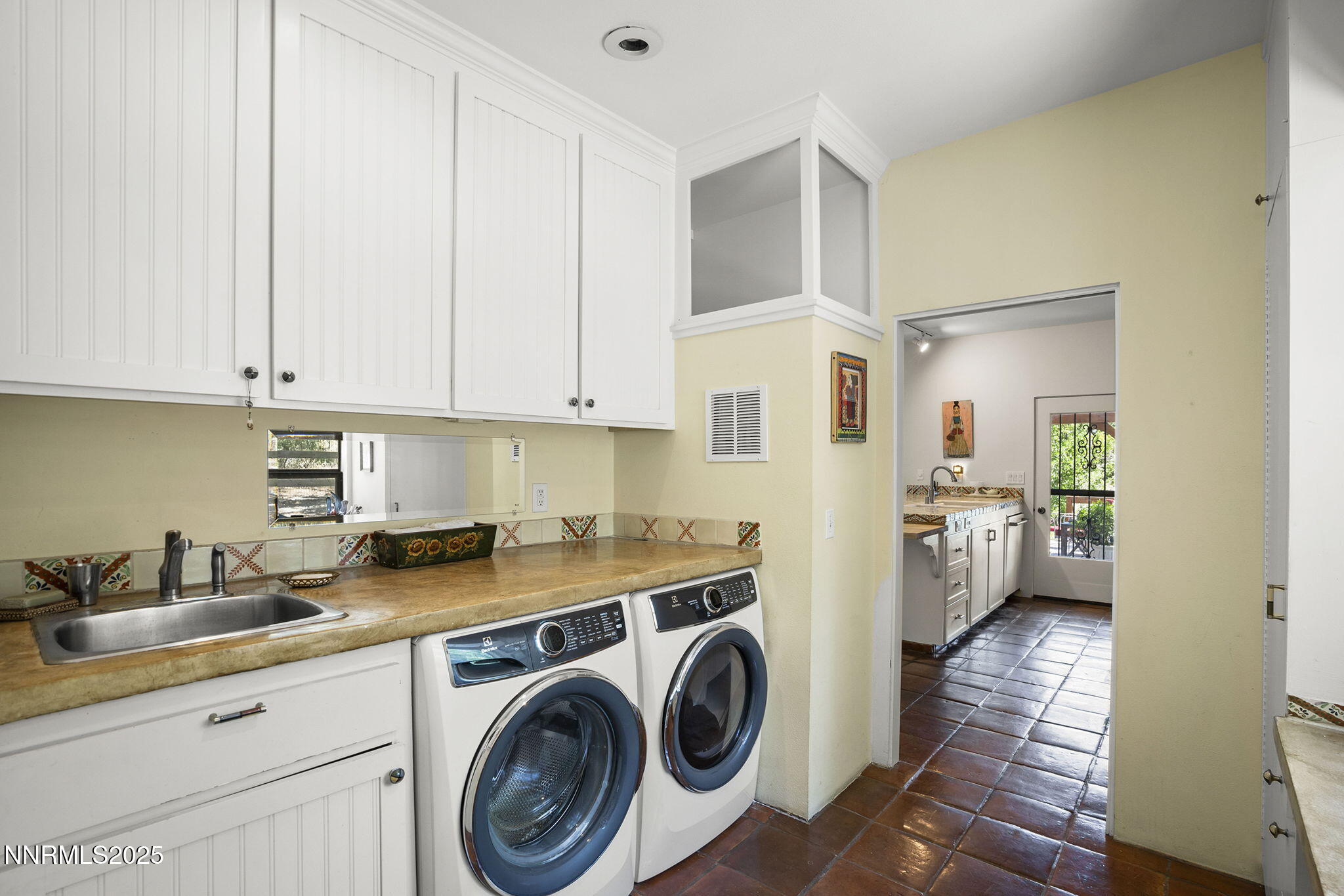 2548 Jacks Valley Road Genoa, NV 89411 - Photo 28 of 51 a view of a kitchen with refrigerator and sink