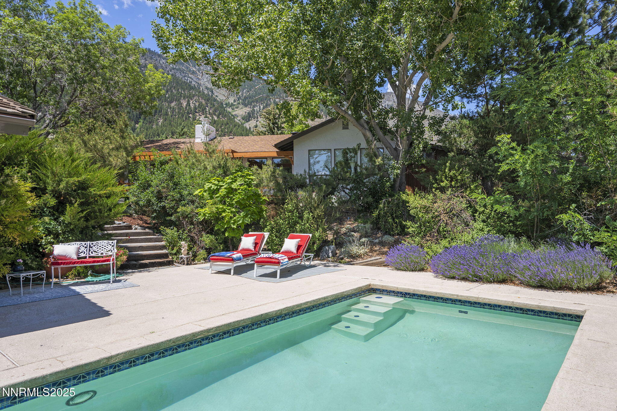 2548 Jacks Valley Road Genoa, NV 89411 - Photo 4 of 51 an outdoor space with furniture and a fire pit