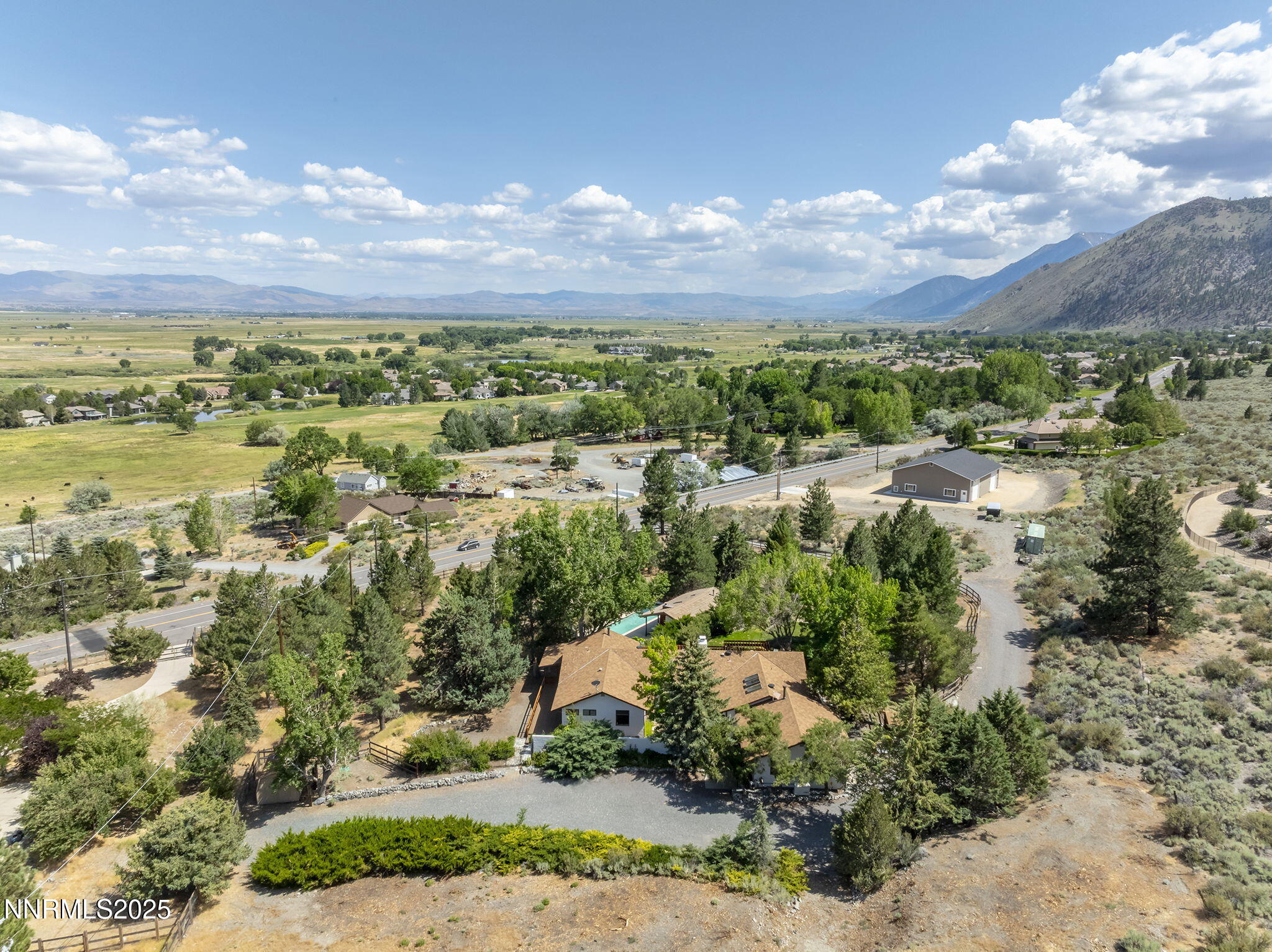 2548 Jacks Valley Road Genoa, NV 89411 - Photo 41 of 51 a view of a lake with mountains in the background