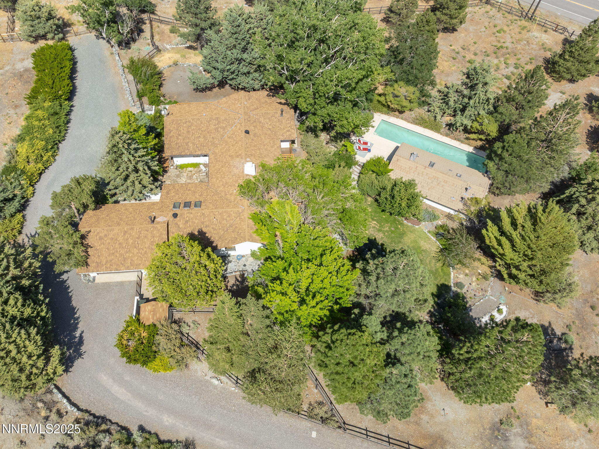 2548 Jacks Valley Road Genoa, NV 89411 - Photo 43 of 51 an aerial view of a house with a yard and lake view