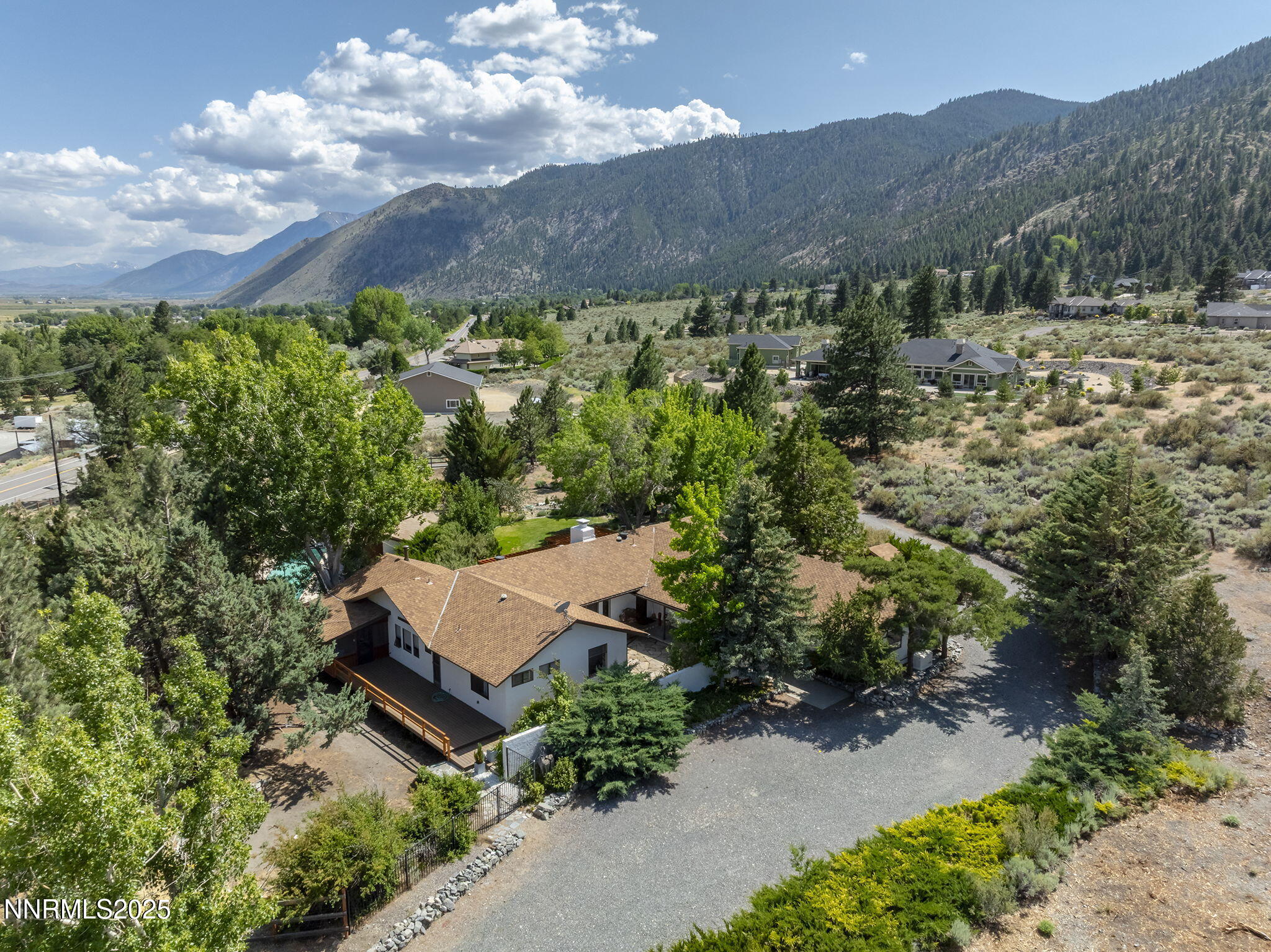2548 Jacks Valley Road Genoa, NV 89411 - Photo 50 of 51 an aerial view of a house with a garden