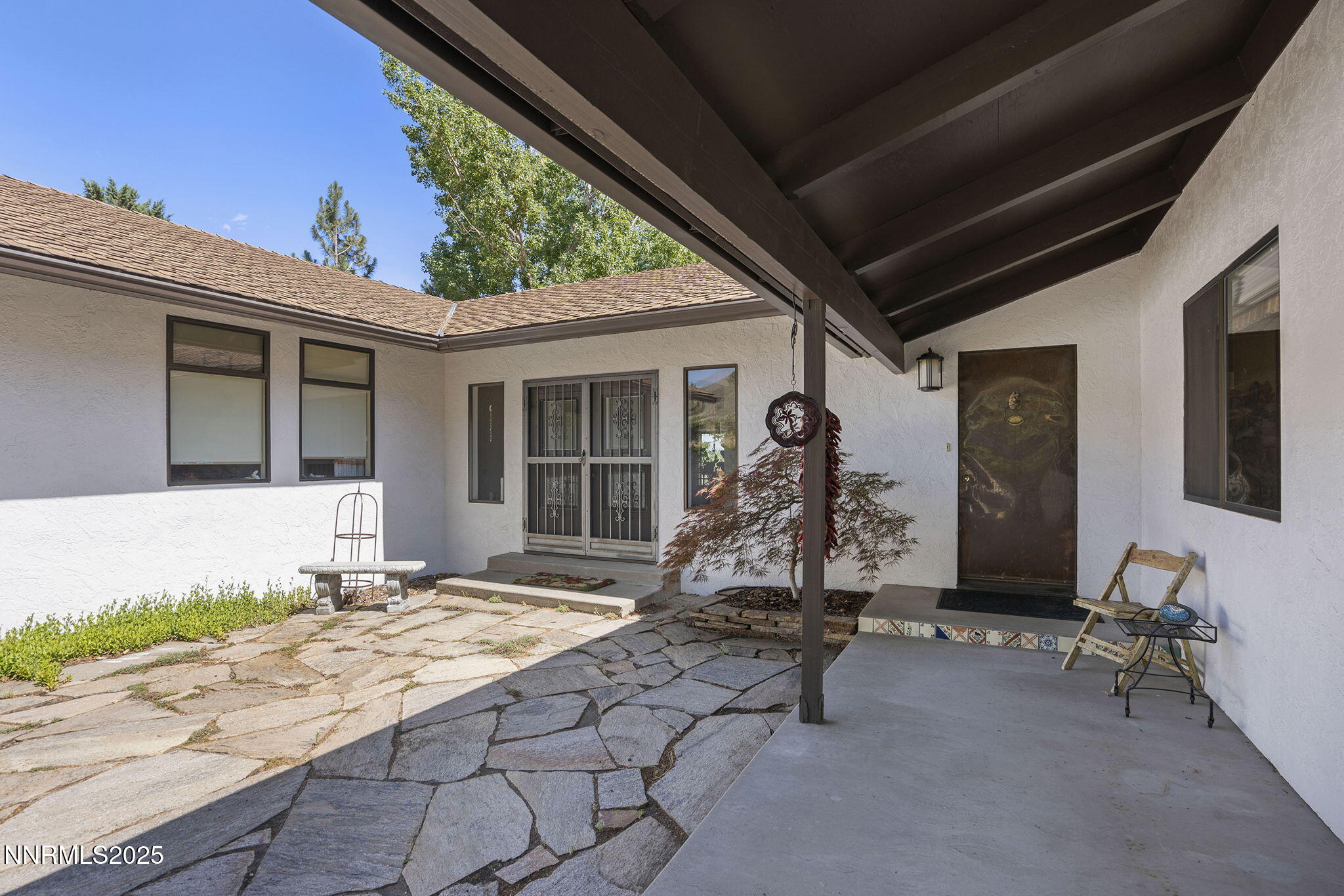 2548 Jacks Valley Road Genoa, NV 89411 - Photo 6 of 51 a house with trees in front of it
