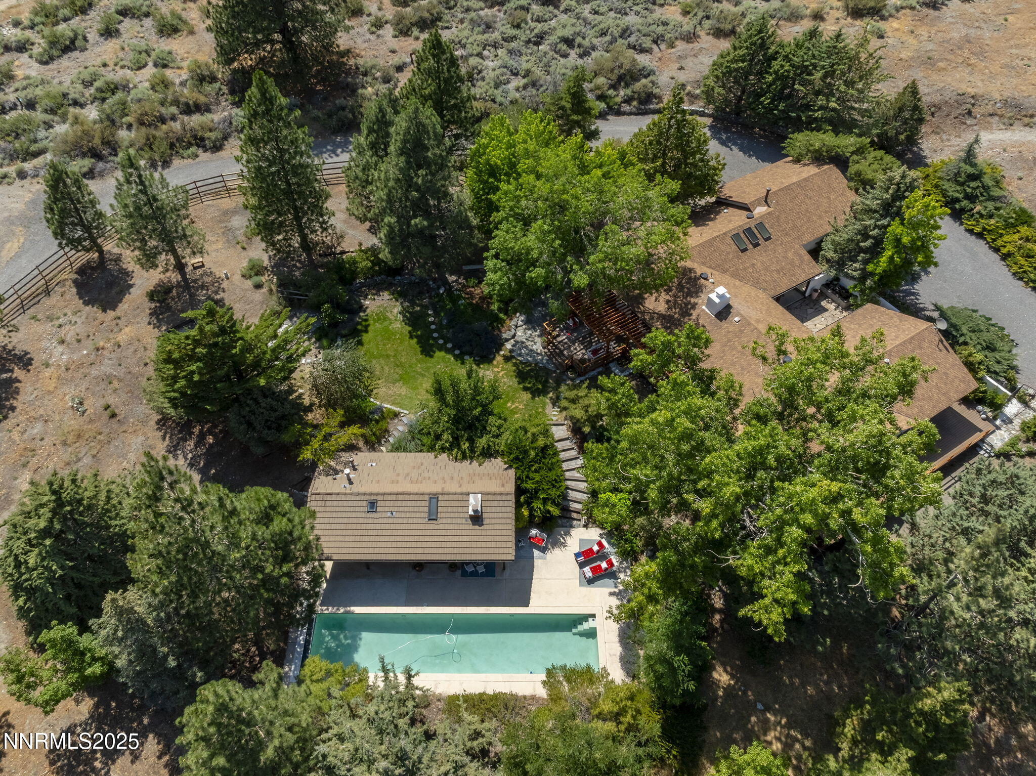 2548 Jacks Valley Road Genoa, NV 89411 - Photo 9 of 51 an aerial view of a house with a yard and garden