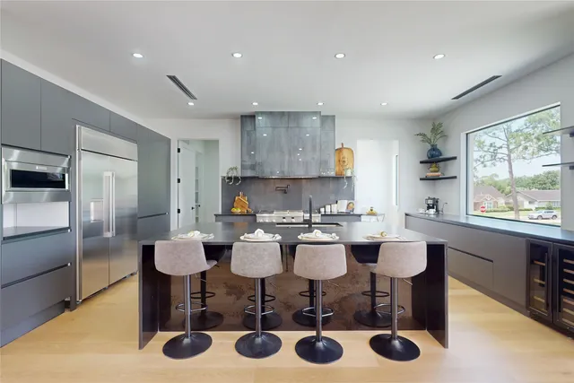 a view of kitchen with dining table and chairs