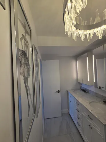 a view of a decorative light fixtures and windows