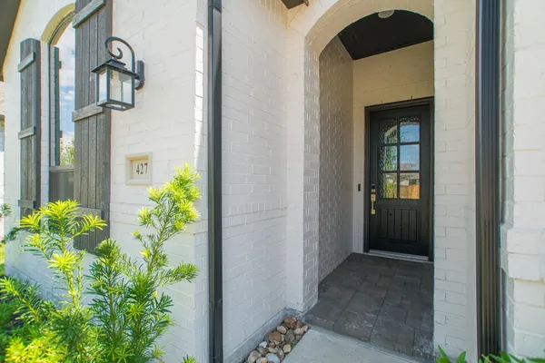 a view of a entryway door of the house