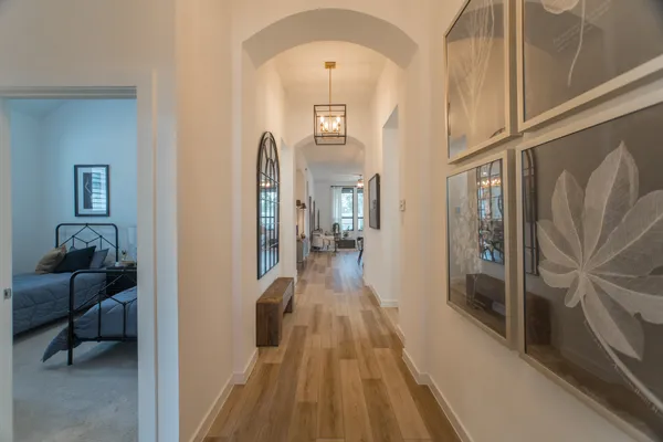 a view of a hallway view with living room