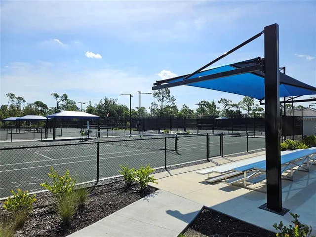 a view of a park with a slide