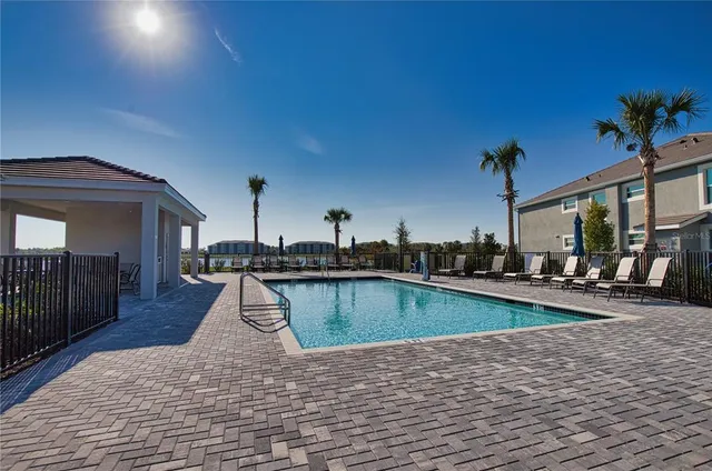 a view of a living room and kitchen
