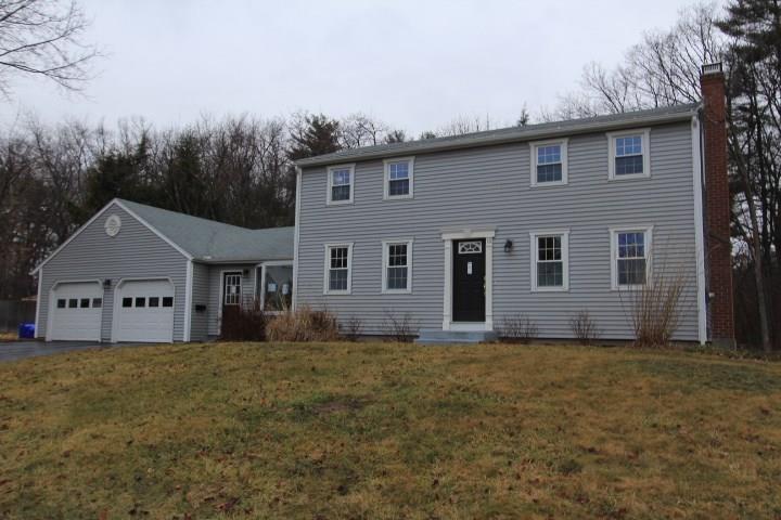 33 Betty Road Enfield, CT 06082 - Photo 1 of 1 a front view of a house with a yard