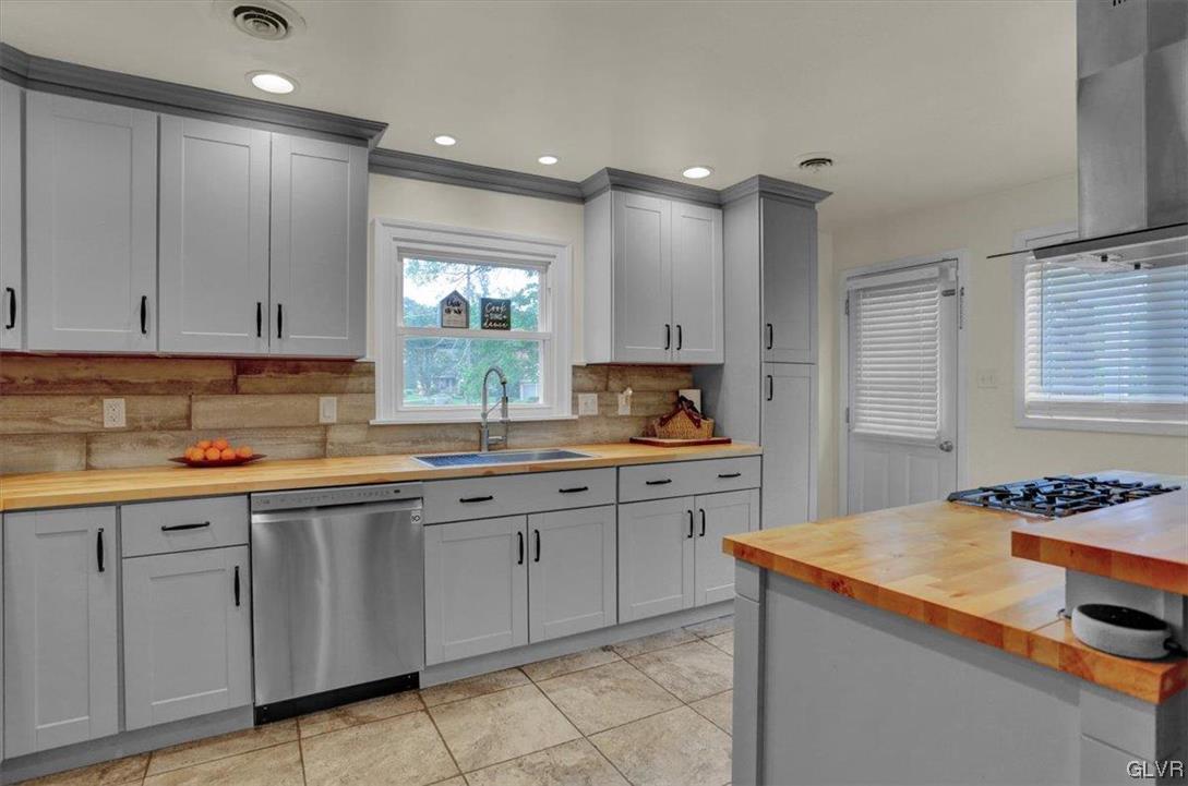 210 Rothermel Boulevard Reading, PA 19605 - Photo 12 of 26 a kitchen that has a sink and cabinets in it