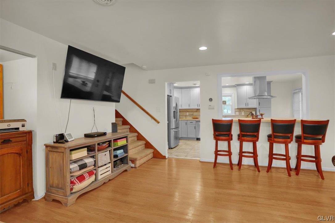 210 Rothermel Boulevard Reading, PA 19605 - Photo 16 of 26 a living room with furniture and a flat screen tv