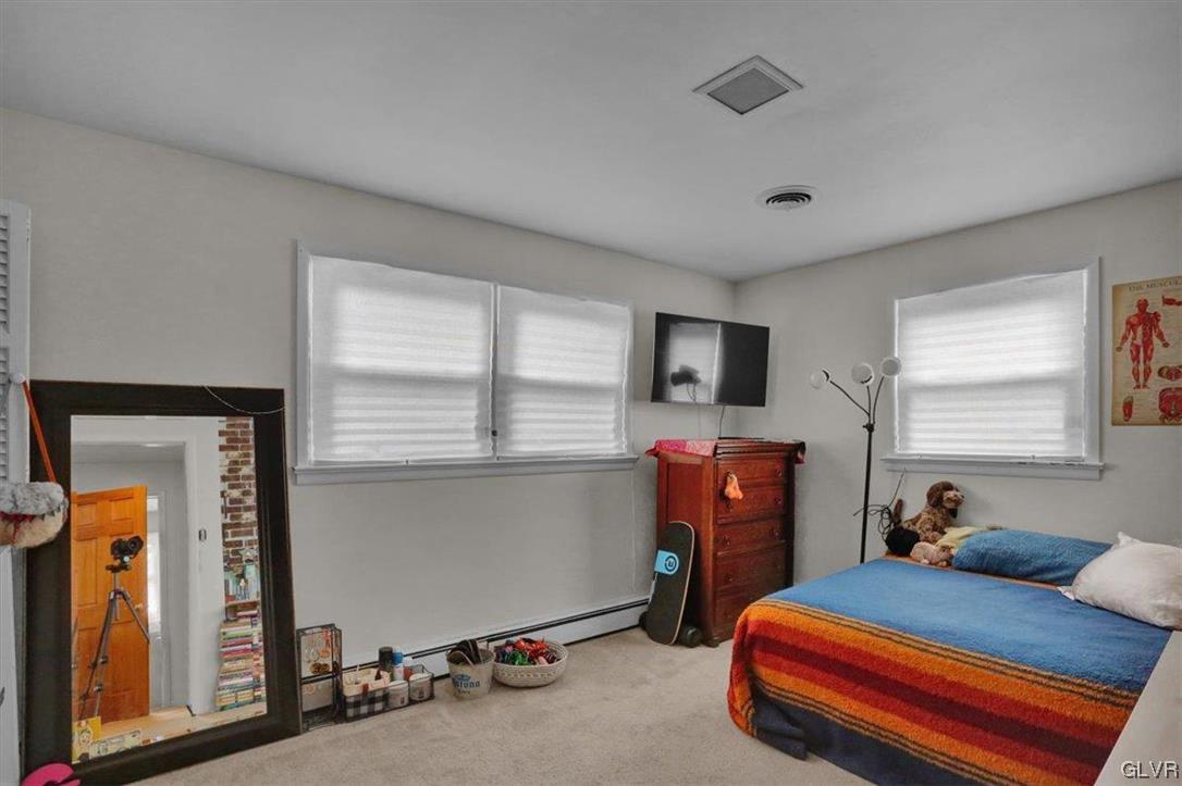210 Rothermel Boulevard Reading, PA 19605 - Photo 17 of 26 a bedroom with furniture and window