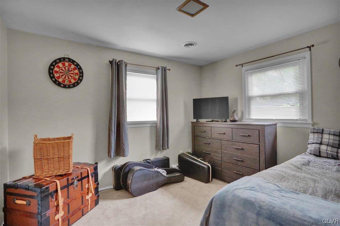 210 Rothermel Boulevard Reading, PA 19605 - Photo 19 of 26 a bedroom with a bed and wooden floor