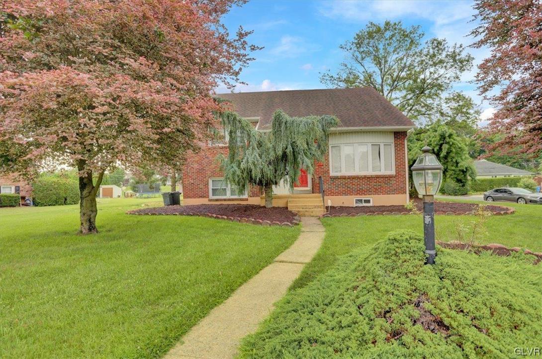 210 Rothermel Boulevard Reading, PA 19605 - Photo 2 of 26 a view of a house with a yard