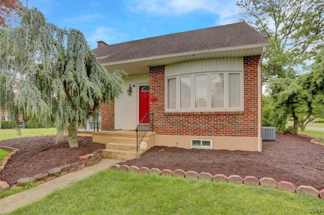 210 Rothermel Boulevard Reading, PA 19605 - Photo 26 of 26 a front view of a house with a yard and garage