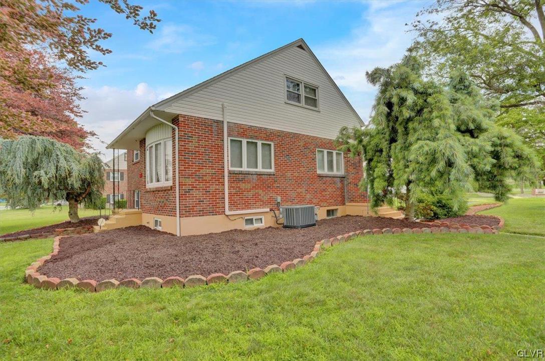 210 Rothermel Boulevard Reading, PA 19605 - Photo 3 of 26 a view of a house with a yard