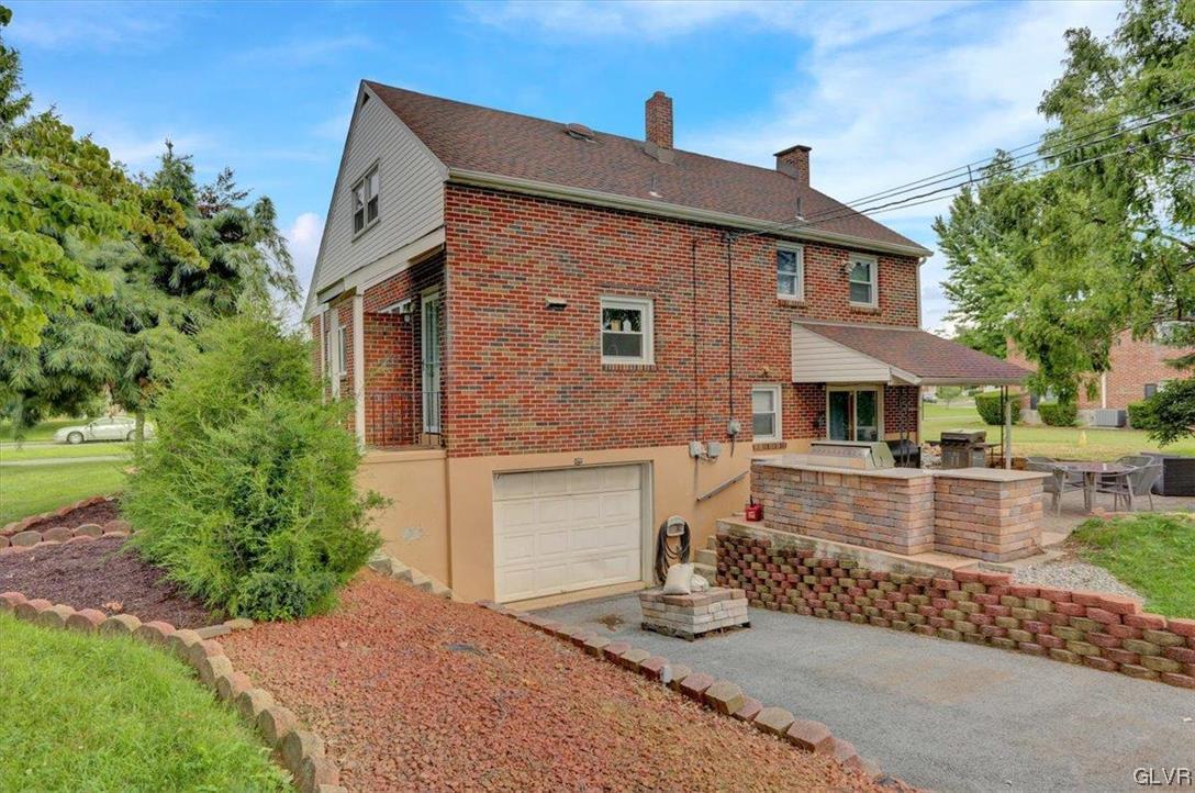 210 Rothermel Boulevard Reading, PA 19605 - Photo 4 of 26 a front view of a house with a yard and balcony