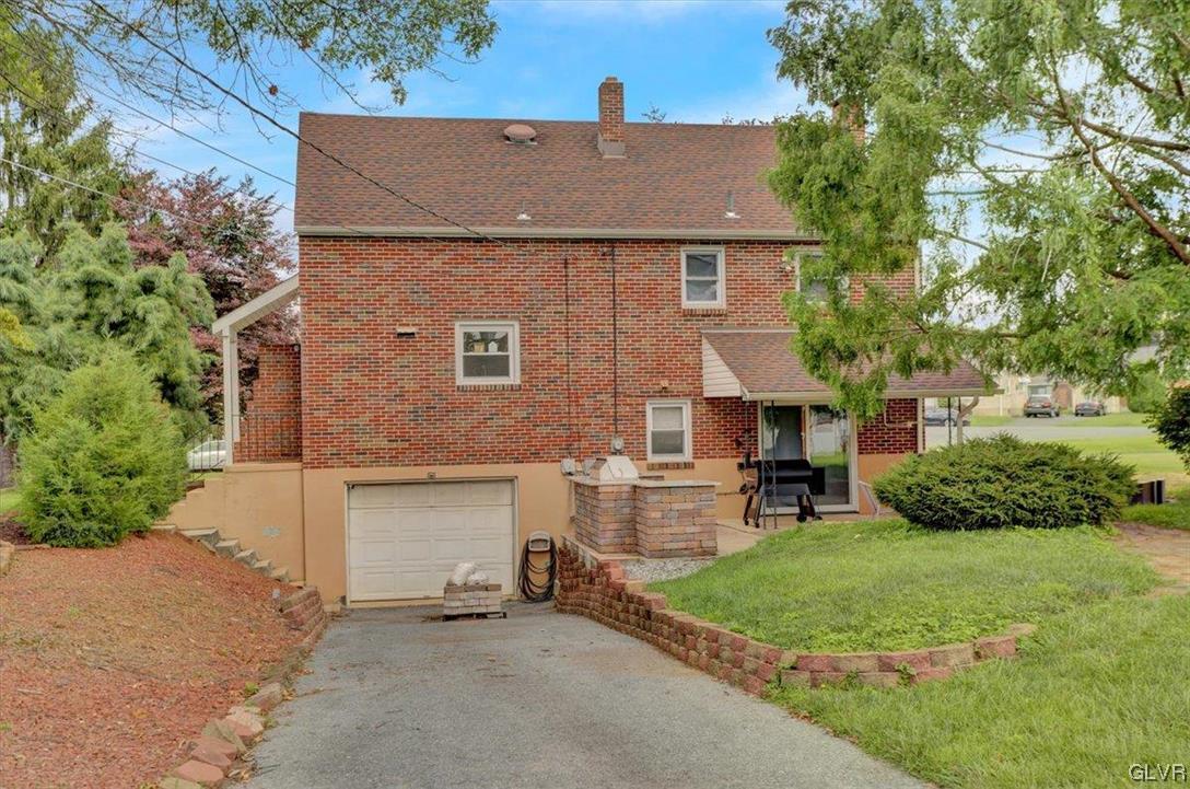 210 Rothermel Boulevard Reading, PA 19605 - Photo 7 of 26 front view of a house with a yard