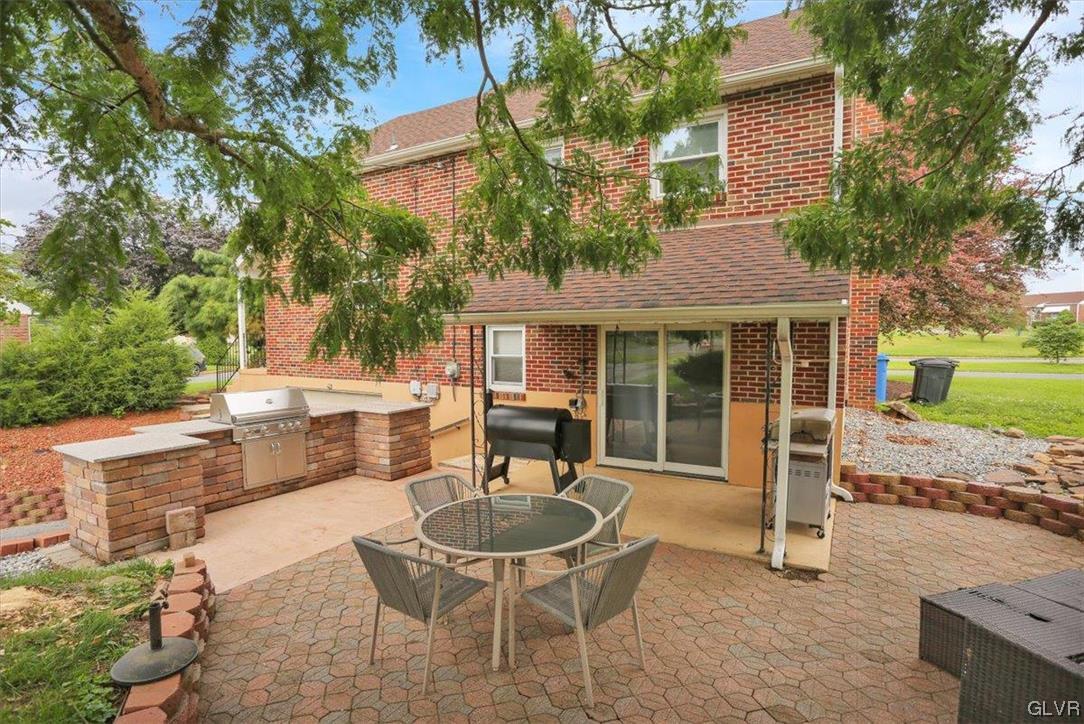210 Rothermel Boulevard Reading, PA 19605 - Photo 8 of 26 a view of a house with backyard and sitting area