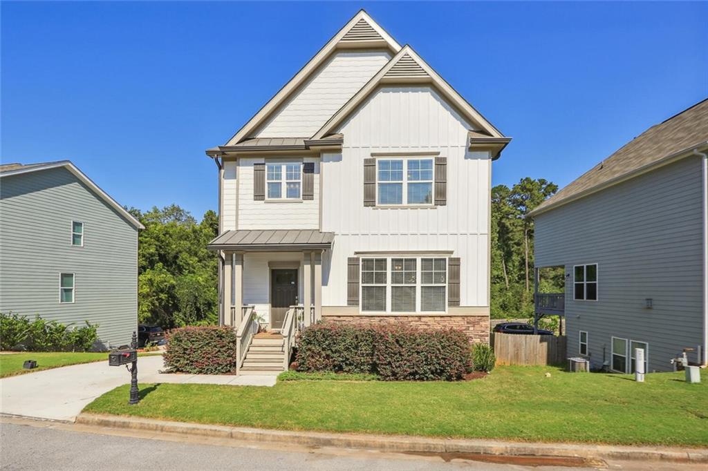 2602 Tilson Road Decatur, GA 30032 - Photo 1 of 1 a front view of a house with a yard