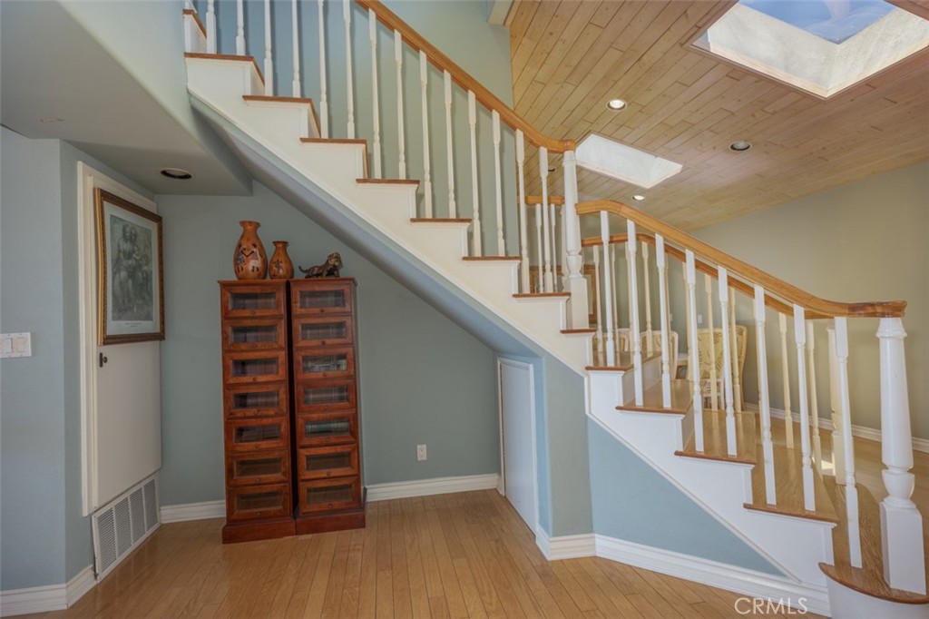 33571 Binnacle Drive Dana Point, CA 92629 - Photo 11 of 48 a view of entryway with stairs and wooden floor