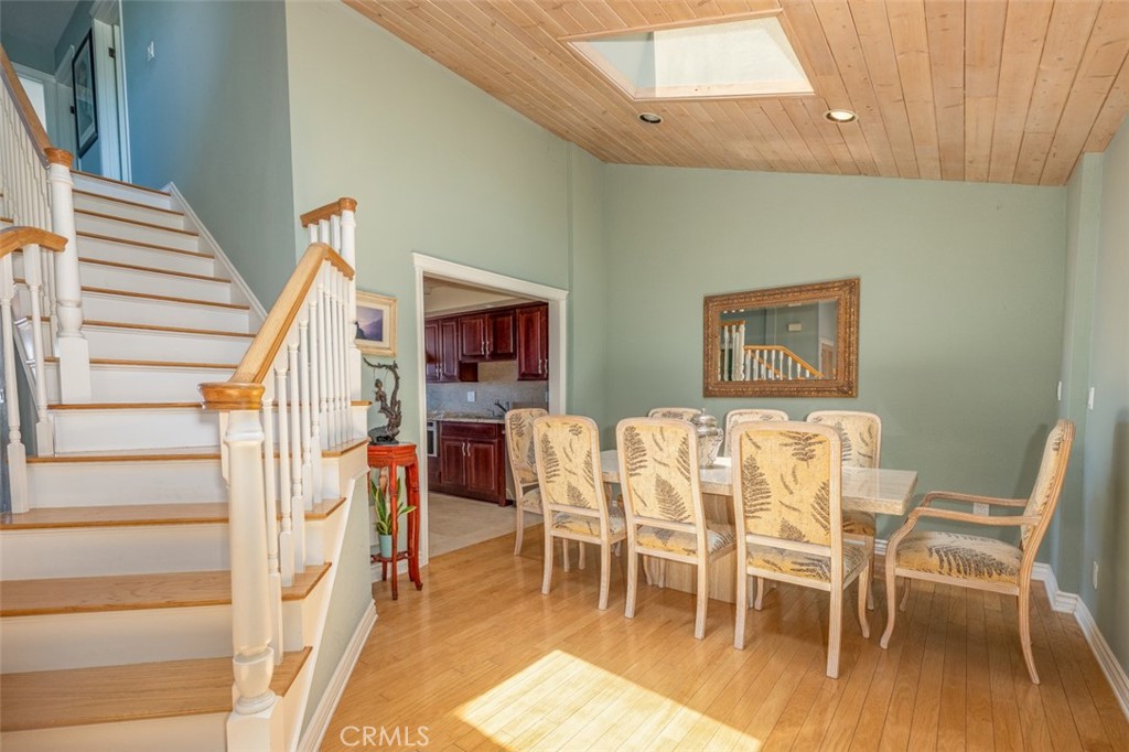 33571 Binnacle Drive Dana Point, CA 92629 - Photo 6 of 48 a dining room with furniture and wooden floor