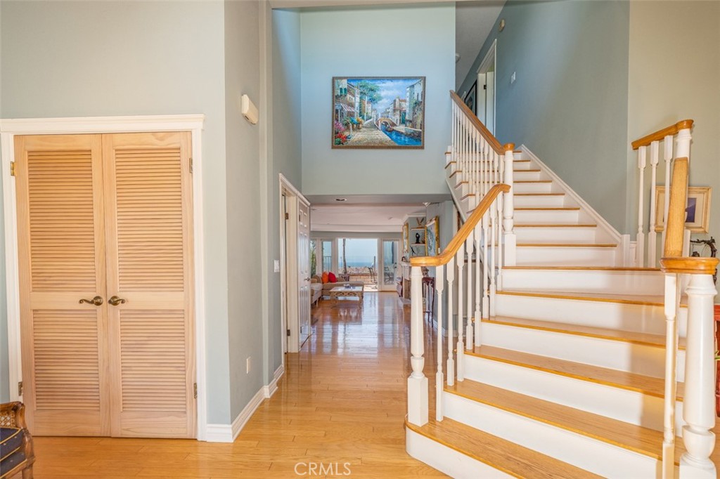 33571 Binnacle Drive Dana Point, CA 92629 - Photo 8 of 48 a view of a hallway with wooden floor and entryway