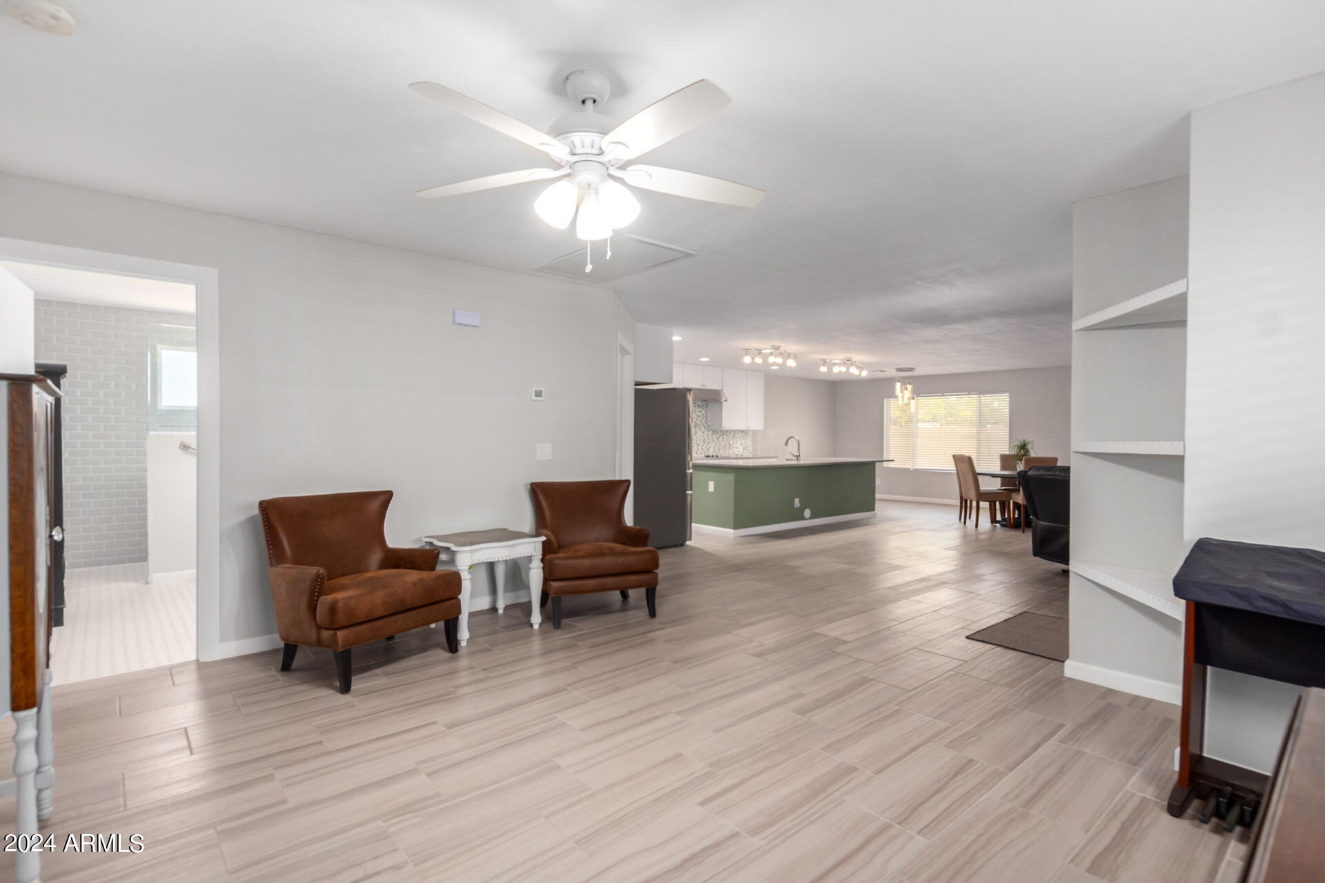3216 West Hearn Road Phoenix, AZ 85053 - Photo 13 of 32 a living room with furniture and a wooden floor