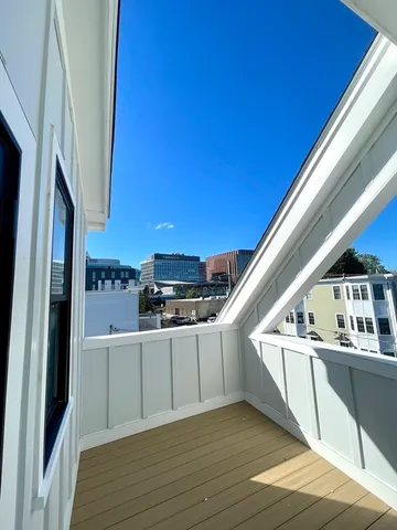 a view of a kitchen with a sink and dishwasher