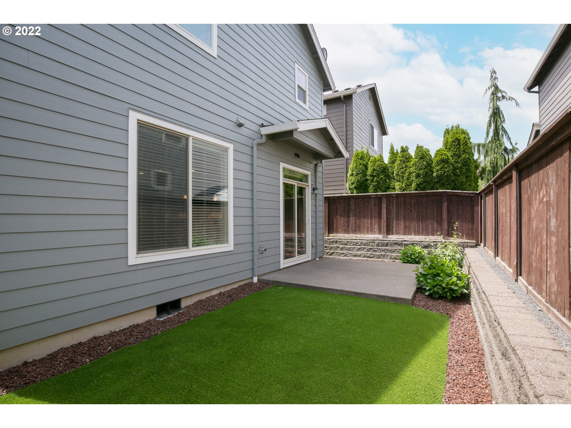 4106 North 5th Way Ridgefield, WA 98642 - Photo 21 of 26 a view of back yard of the house