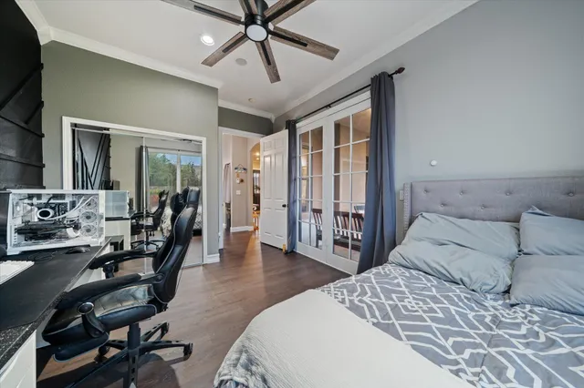 a view of a dining room with furniture and a window