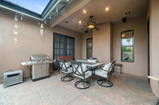 a view of a backyard with plants and a garden