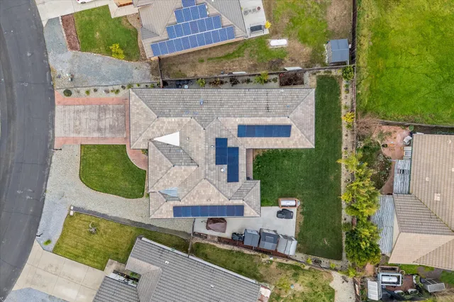 an aerial view of a house with sitting space