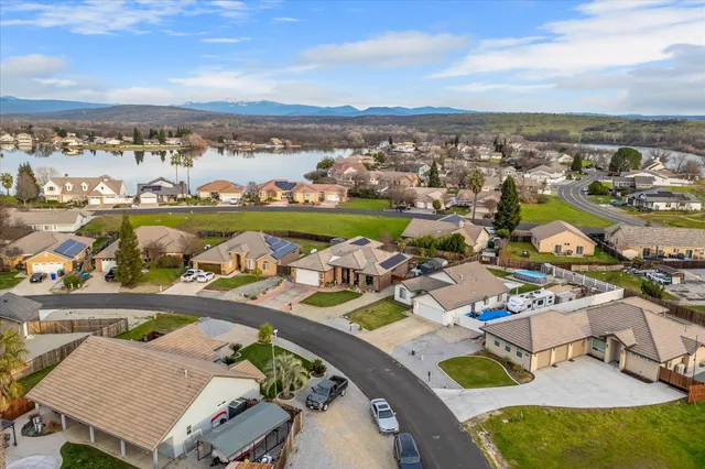 an aerial view of residential building and ocean