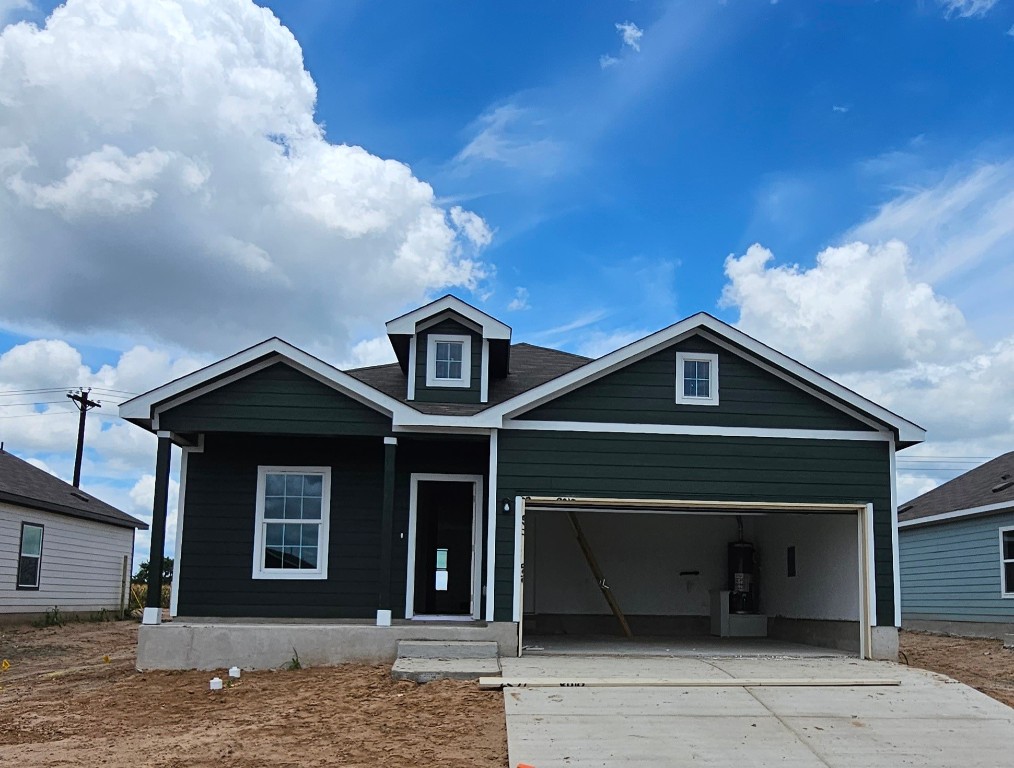 511 Halfmoon Drive Lockhart, TX 78644 - Photo 1 of 1 a front view of a house with a garage