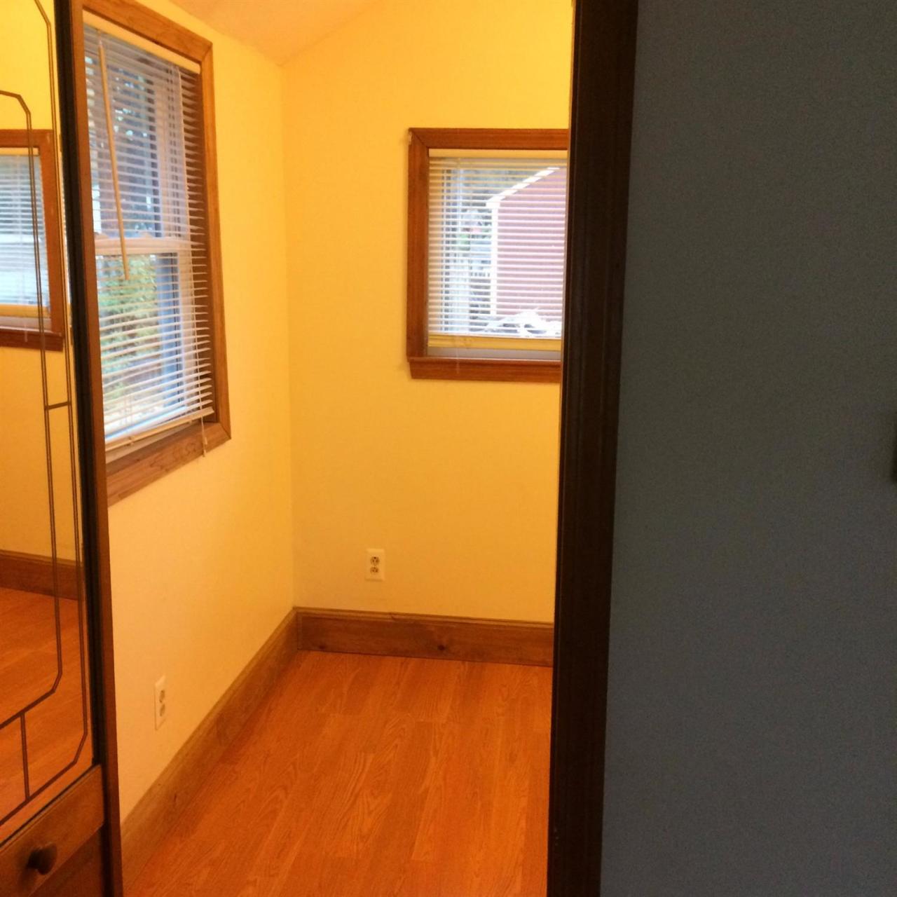 74 Salt Works Road Buzzards Bay, MA 02532 - Photo 8 of 25 a view of an empty room and a window